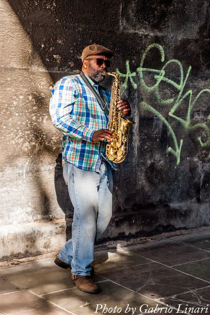 Saxophonist playing in Edinburgh near Princes Street Gardens
